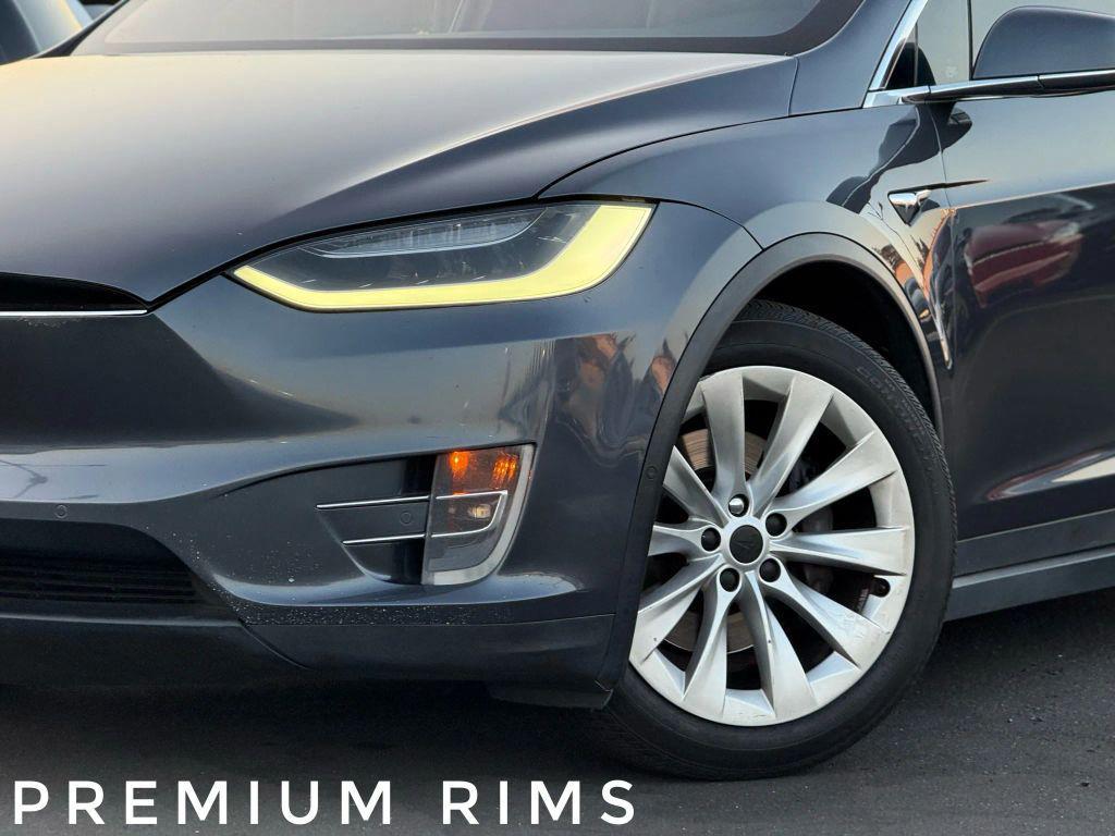 used 2018 Tesla Model X car, priced at $15,999