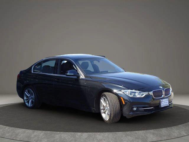 used 2018 BMW 330 car, priced at $19,499