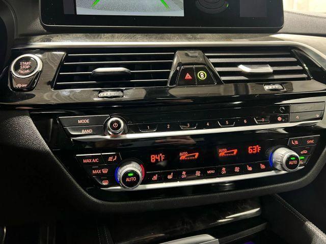 used 2023 BMW M550 car, priced at $50,169