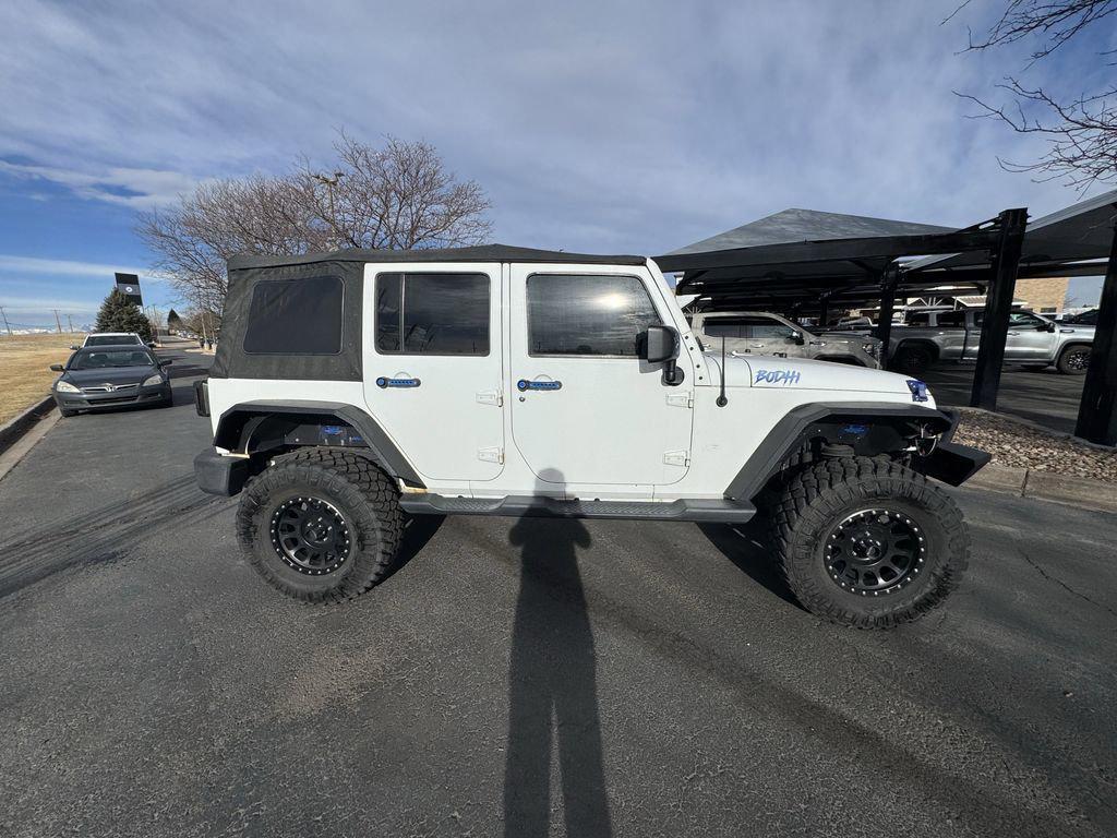 used 2014 Jeep Wrangler Unlimited car, priced at $15,399