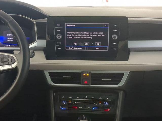 used 2025 Volkswagen Taos car, priced at $25,346
