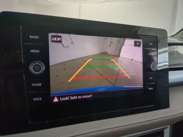 used 2025 Volkswagen Taos car, priced at $25,346