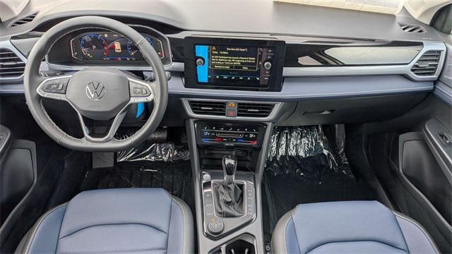 new 2025 Volkswagen Taos car, priced at $30,014