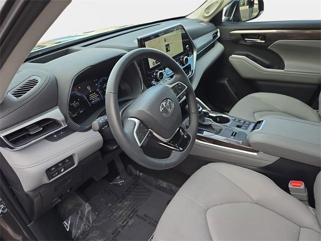 used 2025 Toyota Highlander Hybrid car, priced at $55,799