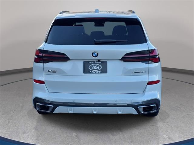 used 2025 BMW X5 car, priced at $60,610