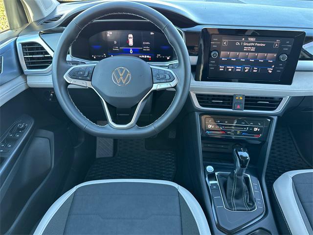 used 2025 Volkswagen Taos car, priced at $26,999