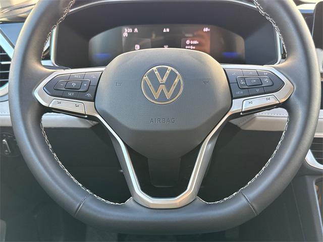 used 2025 Volkswagen Taos car, priced at $22,901