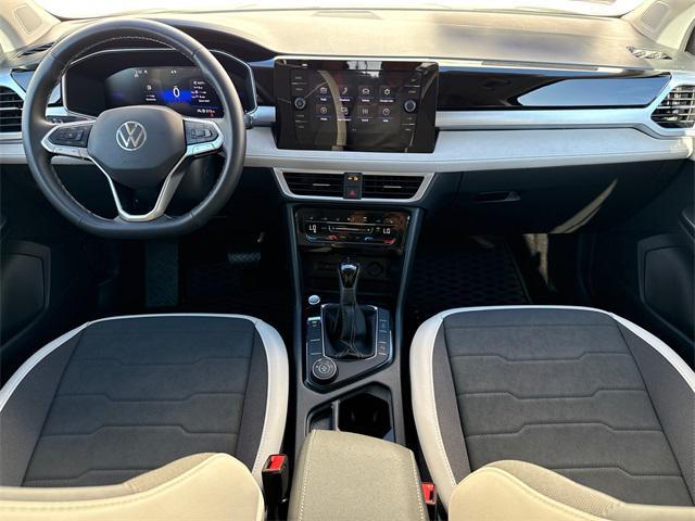 used 2025 Volkswagen Taos car, priced at $22,901