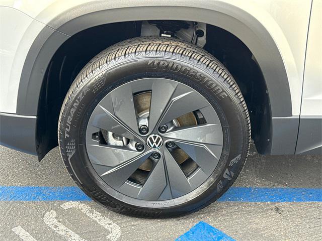 used 2025 Volkswagen Taos car, priced at $19,916