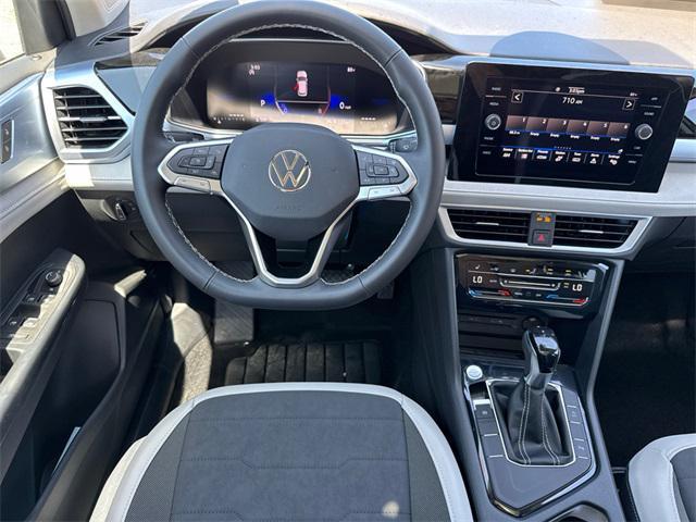 new 2025 Volkswagen Taos car, priced at $26,999