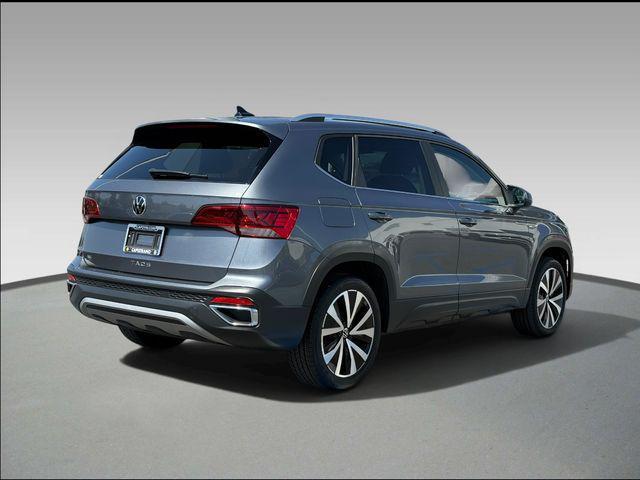 used 2023 Volkswagen Taos car, priced at $21,999