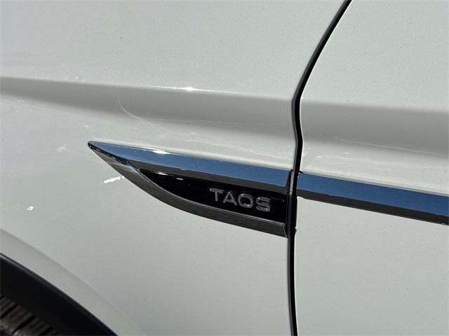 used 2023 Volkswagen Taos car, priced at $20,799