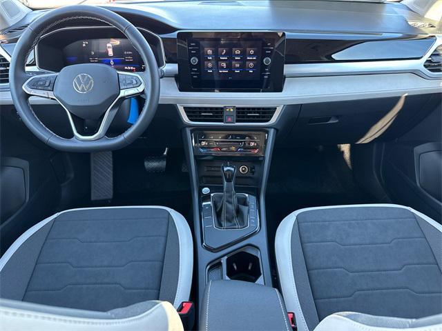new 2025 Volkswagen Taos car, priced at $27,099