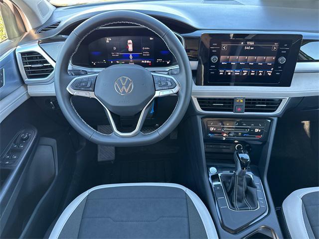 new 2025 Volkswagen Taos car, priced at $27,099