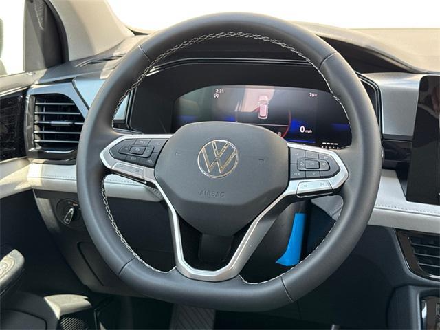 new 2025 Volkswagen Taos car, priced at $22,999