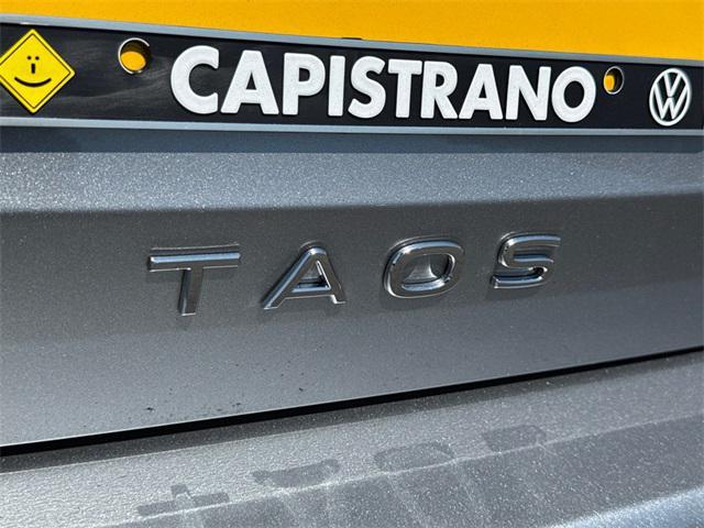 new 2025 Volkswagen Taos car, priced at $22,999