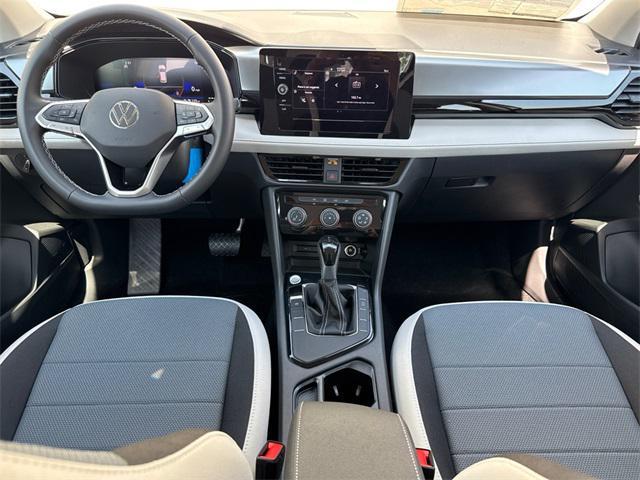 new 2025 Volkswagen Taos car, priced at $22,999