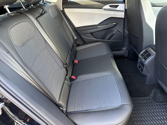 used 2025 Volkswagen Taos car, priced at $22,911