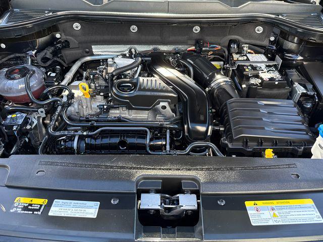 used 2025 Volkswagen Taos car, priced at $22,911