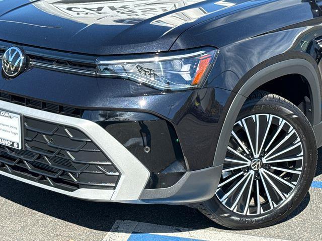 used 2025 Volkswagen Taos car, priced at $22,911