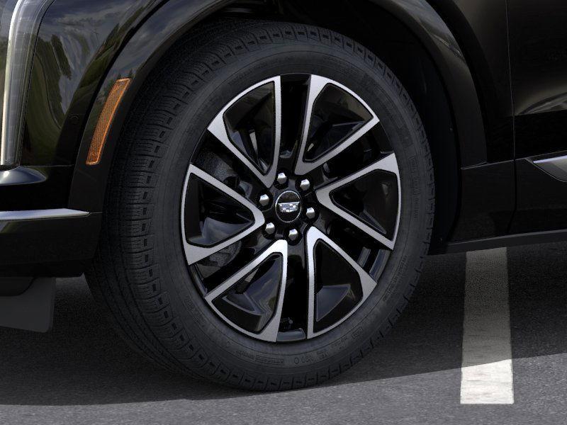 new 2026 Cadillac OPTIQ car, priced at $59,425