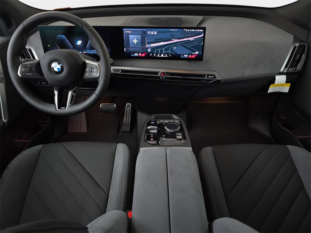 new 2026 BMW iX car, priced at $99,975