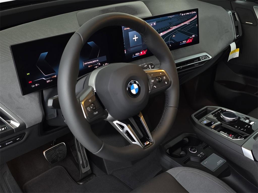 new 2026 BMW iX car, priced at $99,975