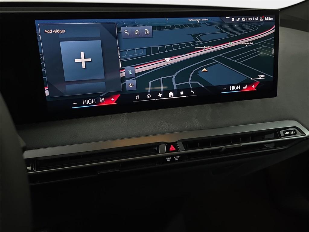 new 2026 BMW iX car, priced at $99,975