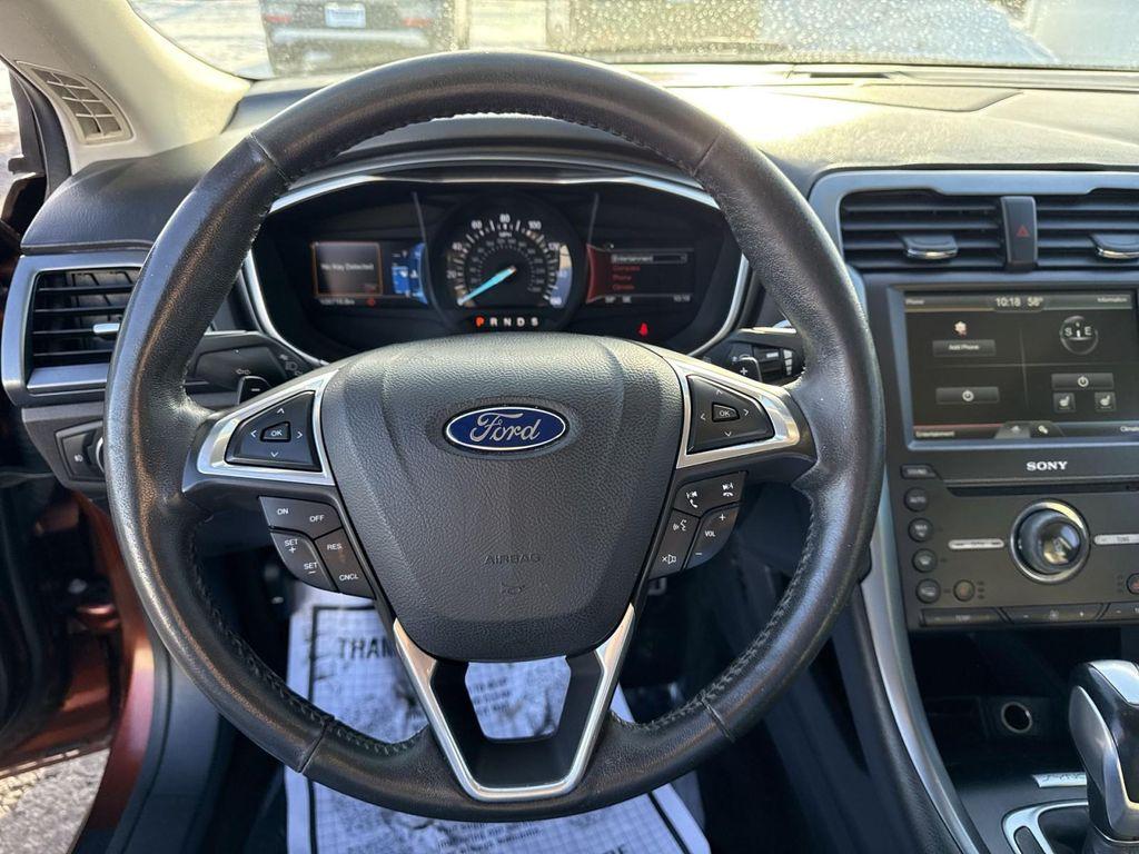 used 2016 Ford Fusion car, priced at $11,495