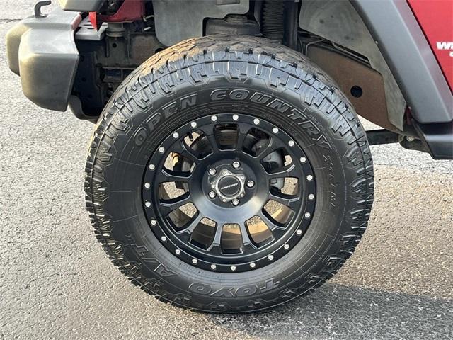 used 2012 Jeep Wrangler Unlimited car, priced at $9,645