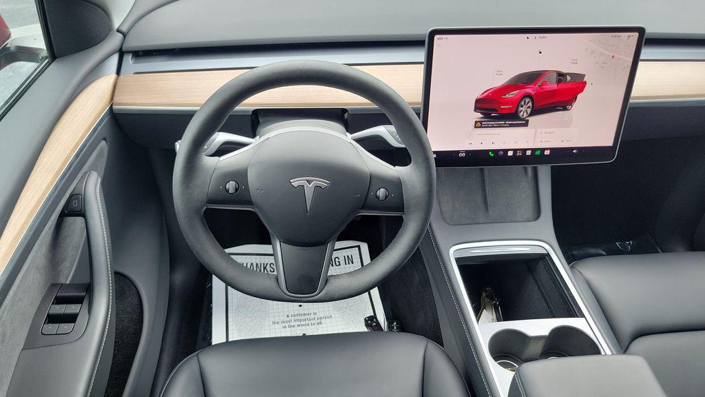 used 2024 Tesla Model Y car, priced at $35,873