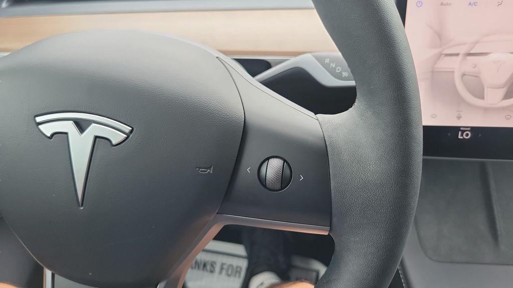 used 2024 Tesla Model Y car, priced at $35,873