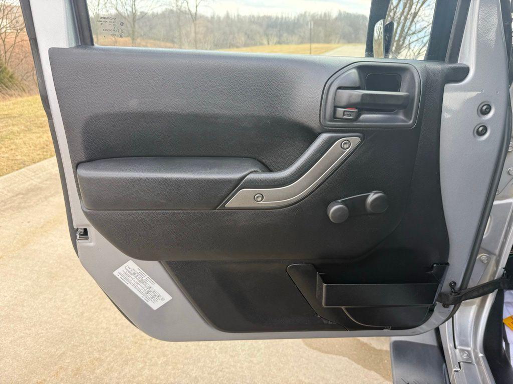 used 2015 Jeep Wrangler car, priced at $13,132