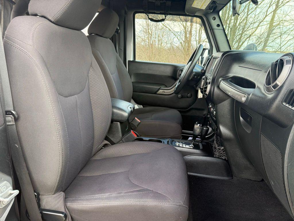 used 2015 Jeep Wrangler car, priced at $13,132