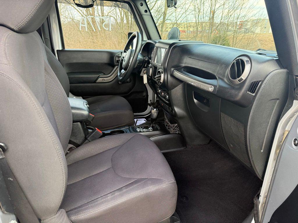 used 2015 Jeep Wrangler car, priced at $13,132