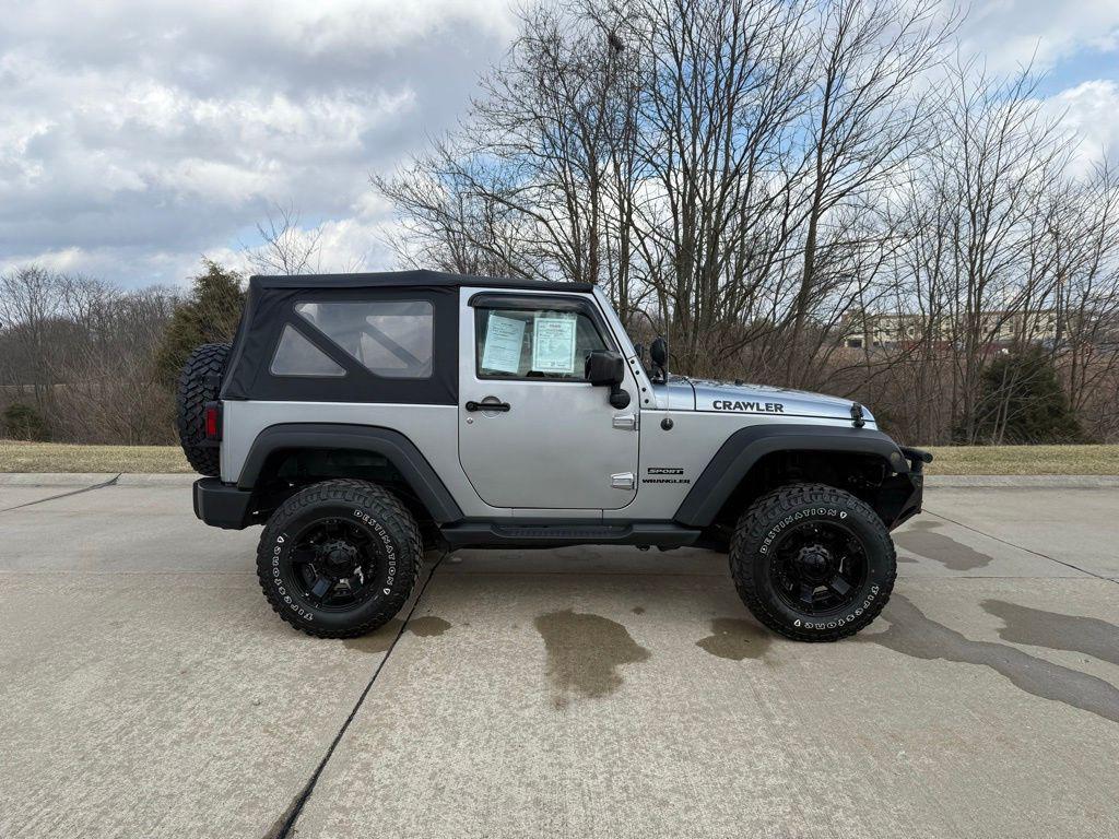 used 2015 Jeep Wrangler car, priced at $13,132