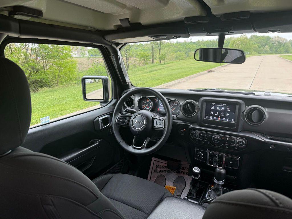 used 2023 Jeep Wrangler car, priced at $28,540