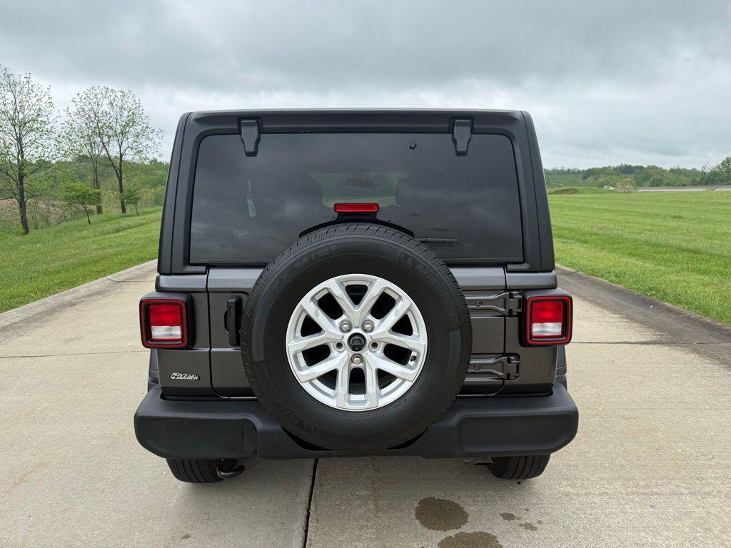 used 2023 Jeep Wrangler car, priced at $28,540