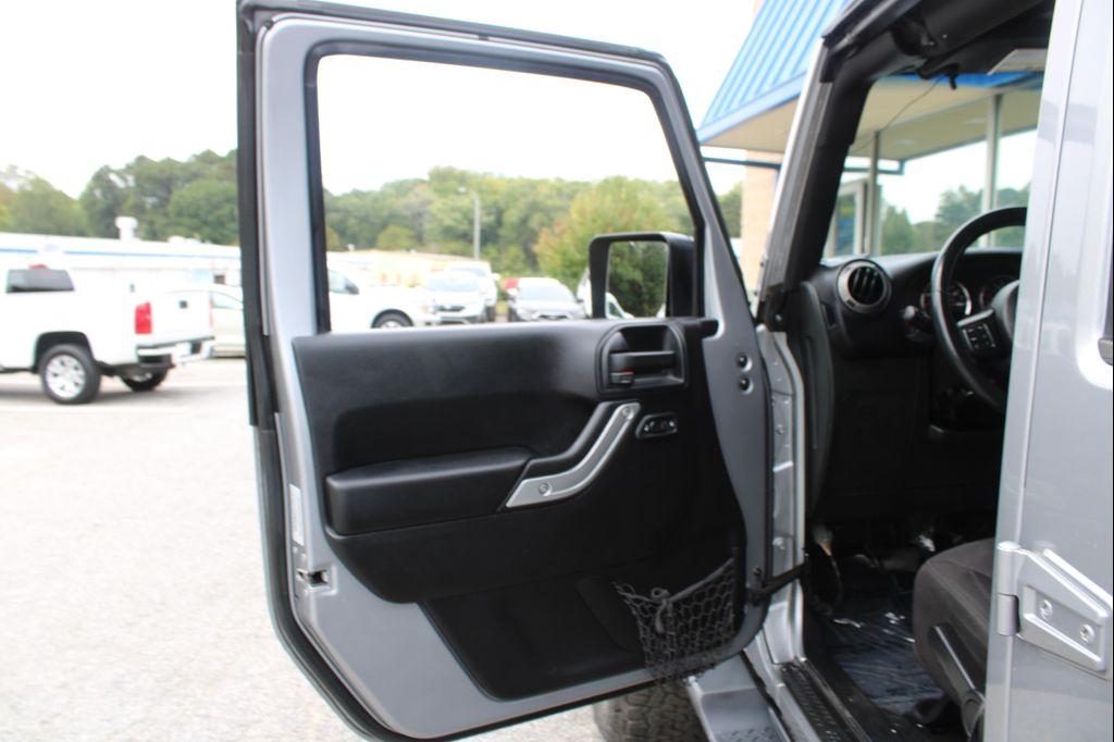 used 2015 Jeep Wrangler Unlimited car, priced at $13,999
