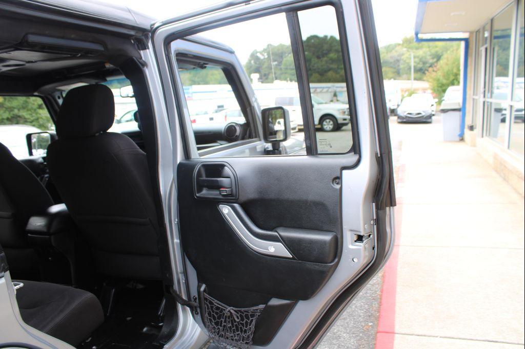 used 2015 Jeep Wrangler Unlimited car, priced at $13,999
