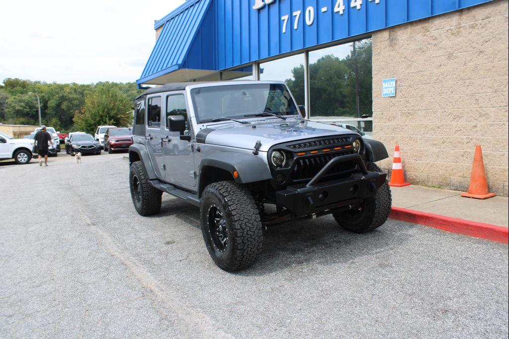 used 2015 Jeep Wrangler Unlimited car, priced at $13,999
