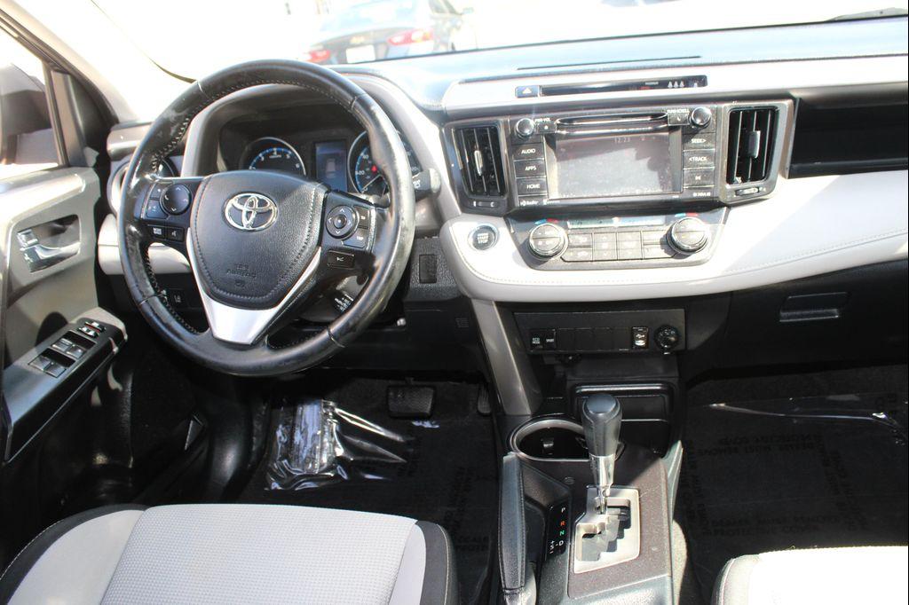 used 2018 Toyota RAV4 car, priced at $20,000
