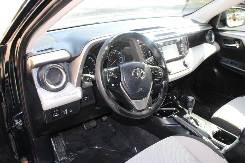 used 2018 Toyota RAV4 car, priced at $20,000