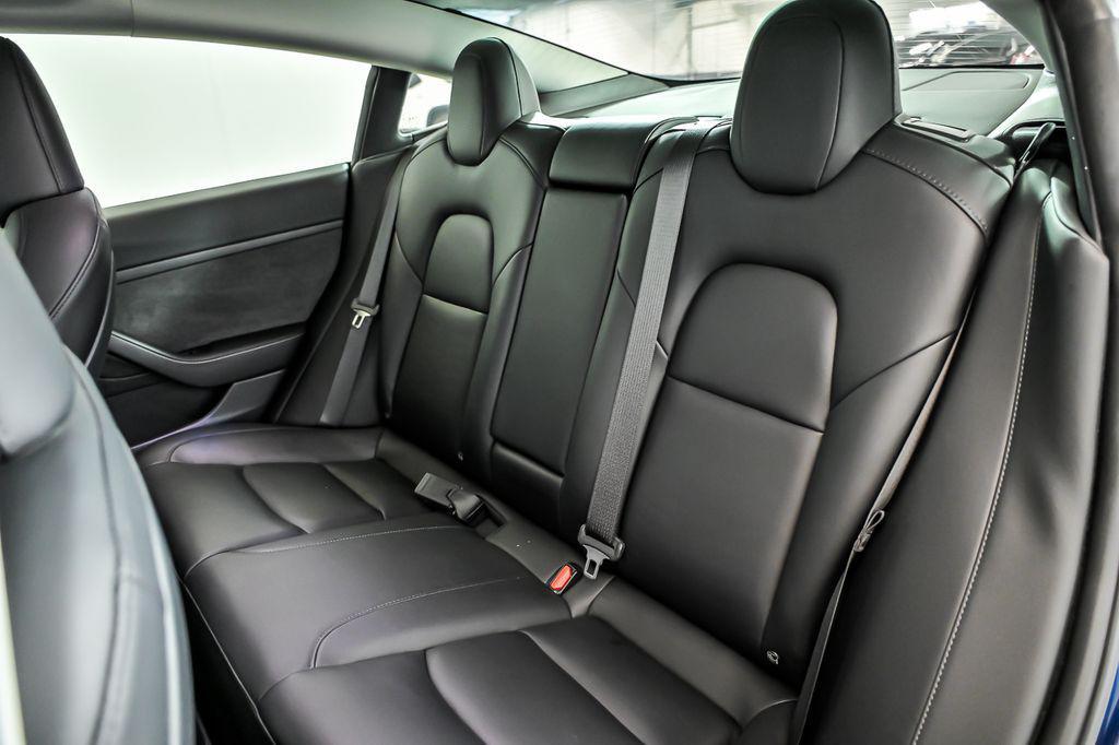 used 2023 Tesla Model 3 car, priced at $34,390