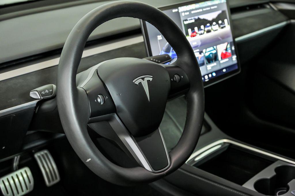 used 2023 Tesla Model 3 car, priced at $34,390