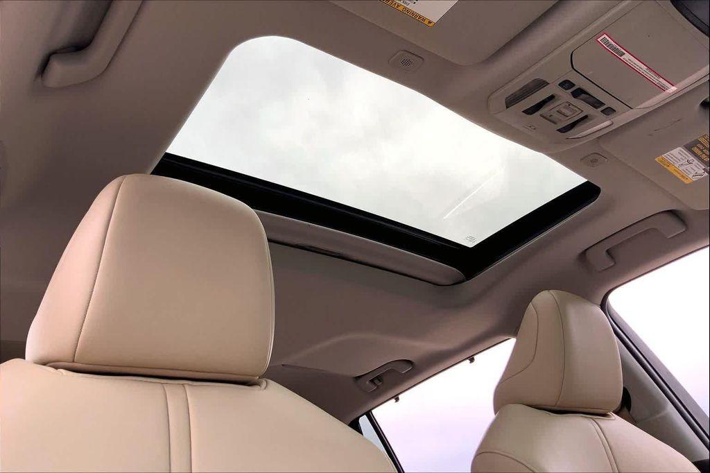 used 2023 Toyota Highlander Hybrid car, priced at $36,499