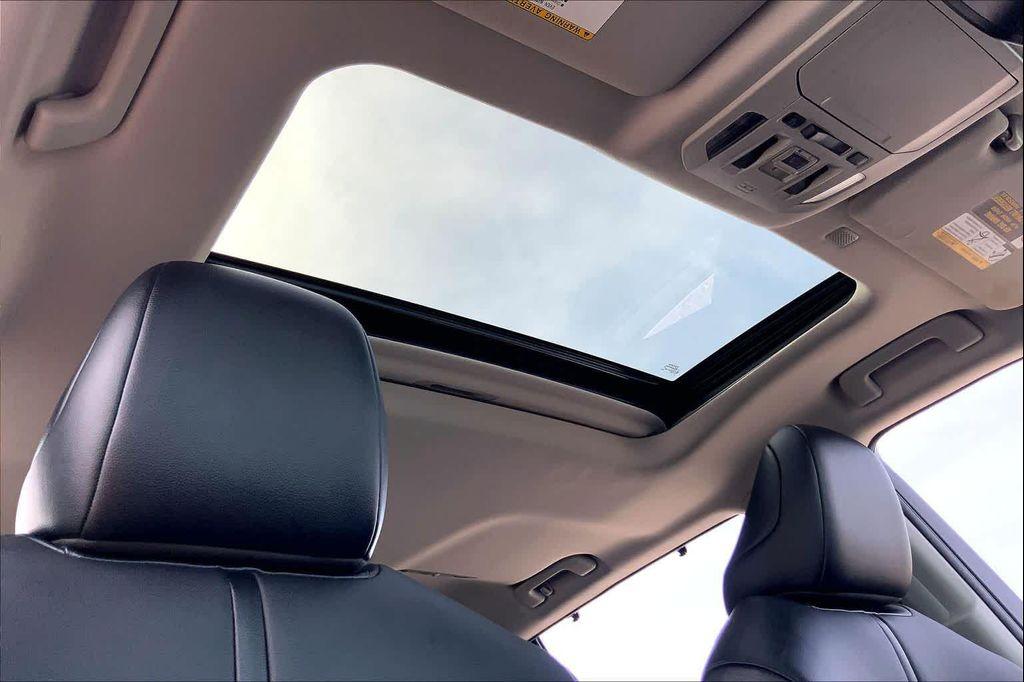 used 2021 Toyota Highlander car, priced at $24,998