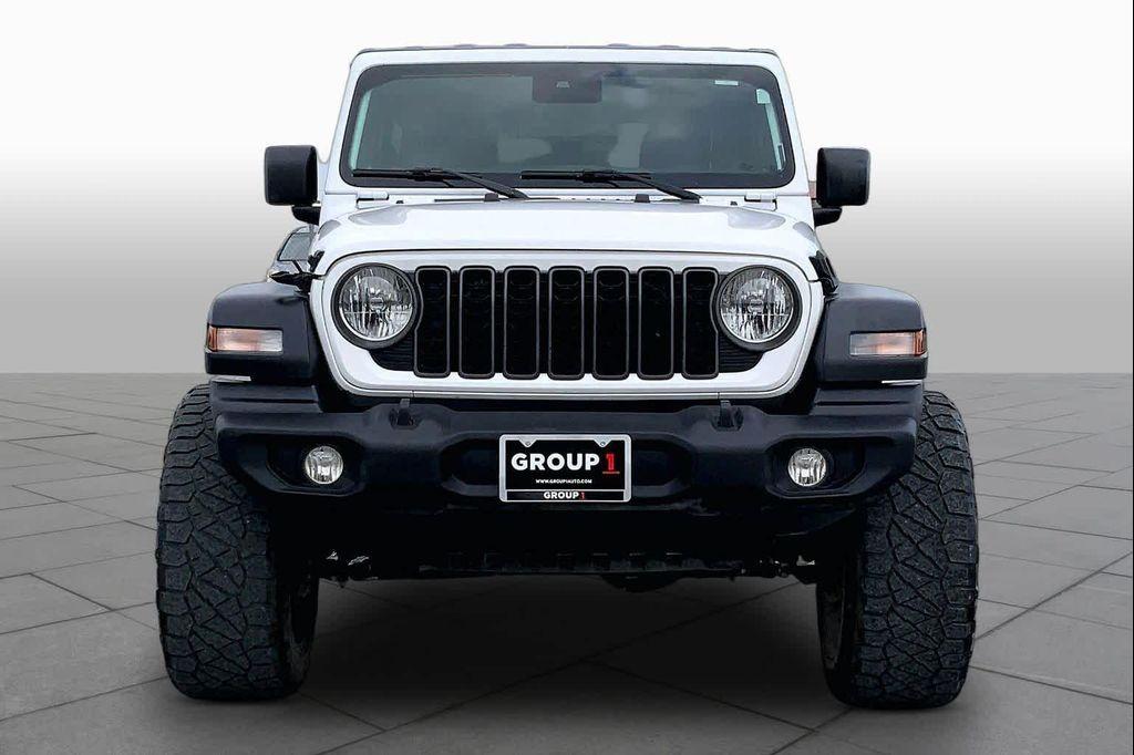 used 2024 Jeep Wrangler car, priced at $33,856