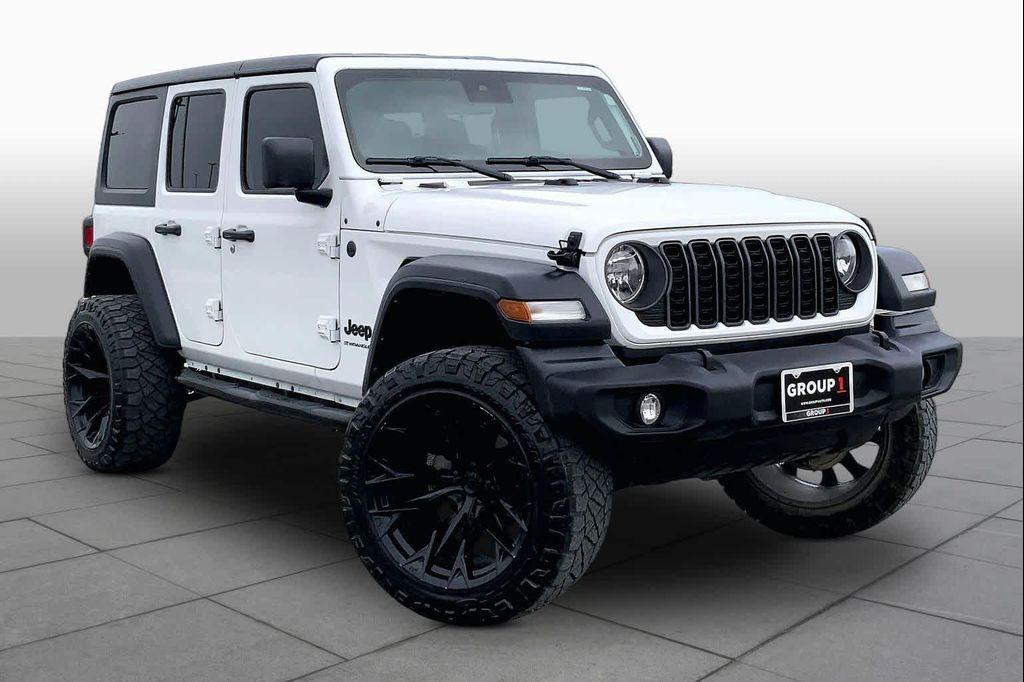 used 2024 Jeep Wrangler car, priced at $33,856