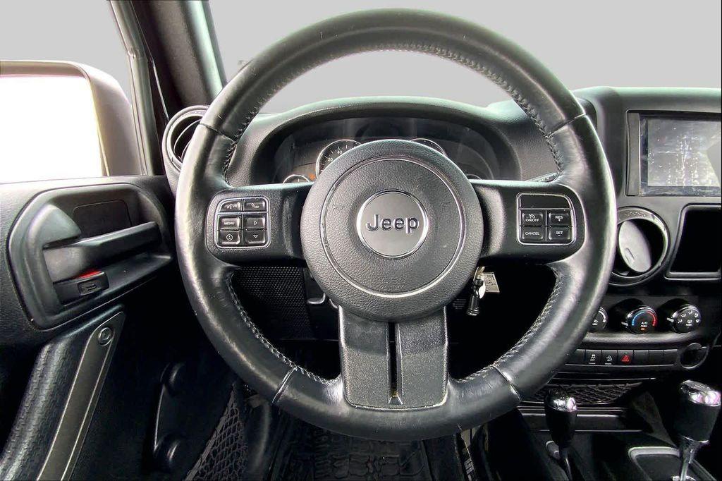 used 2017 Jeep Wrangler Unlimited car, priced at $18,219